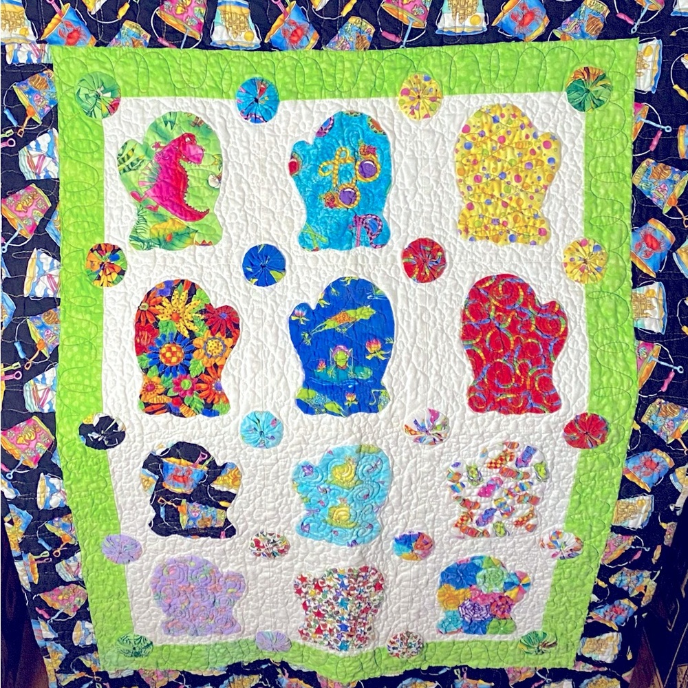 Handmade Quilted Blanket with Mittens Design , Measurements are 34”x26”.